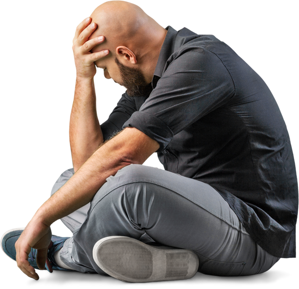 Frustrated Man Sitting on the Floor 