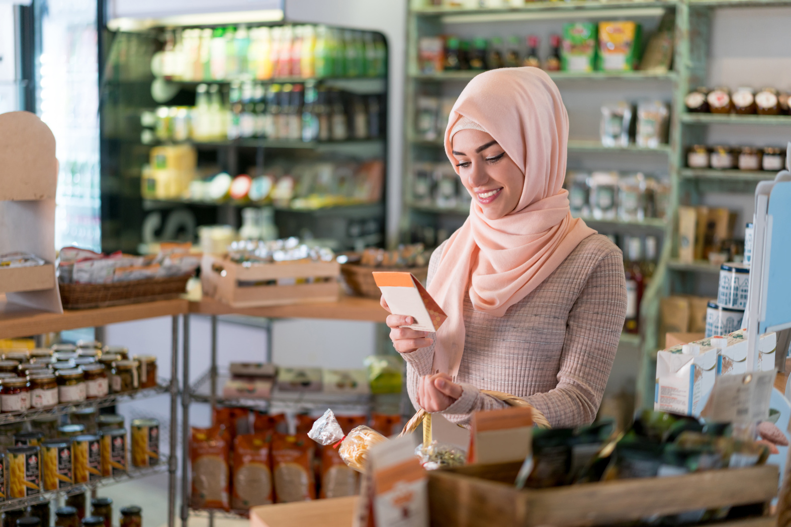 Muslim woman shopping at the grocery shop